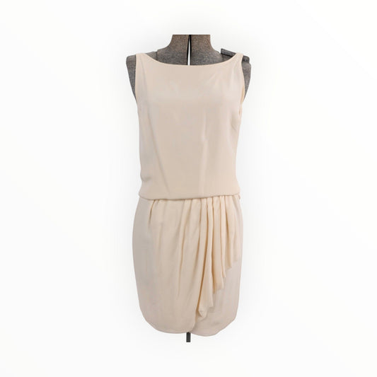 Triple H Treasures vintage Chanel Boutique cream silk crepe sleeveless blouse and draped skirt set on a mannequin.